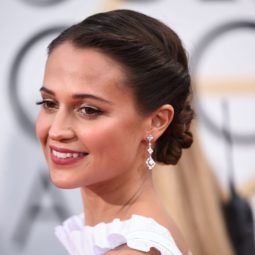 swedish actress alicia vikander at the 2016 golden globe awards with her dark hair in an updo