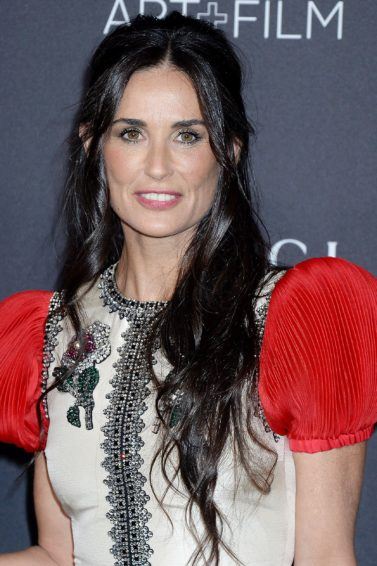 demi moore long dark brown wavy hair in half-up, half-down finish