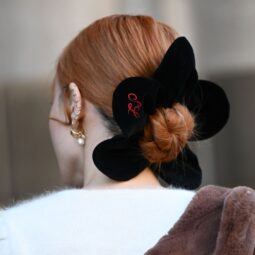 woman wearing a donut bun