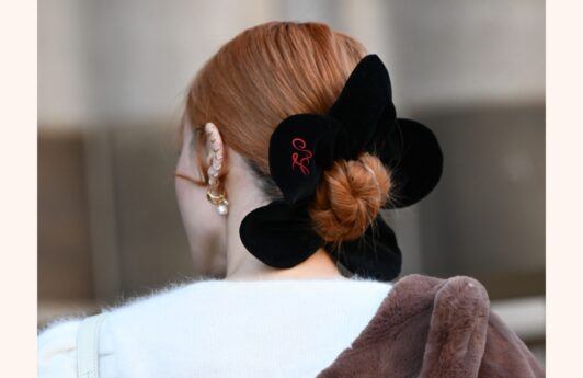 woman wearing a donut bun