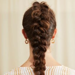 Woman with brown dutch braid