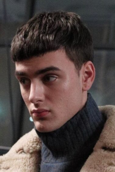 Models with a French crop haircut