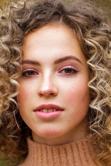 woman with curly blonde hair