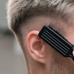 Man getting a Fusey haircut