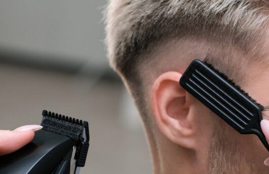 Man getting a Fusey haircut