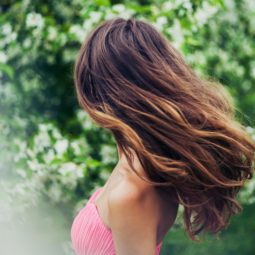 women with ombre hair in pink top