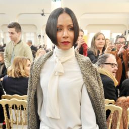 Jada Pinkett Smith at a fashion show with super short black graduated bob hair