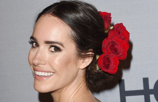 louise roe with roses in her hair