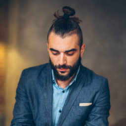 messy man bun hairstyle