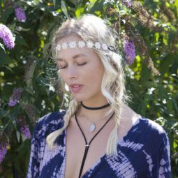 model with blonde pigtails with festival braided hair