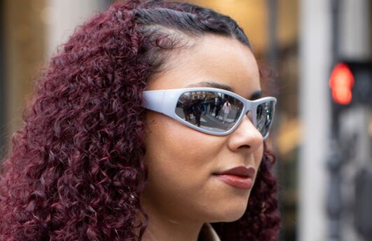 Woman with curly purple hair