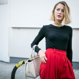 front view of street style model with blonde long bob with side parting