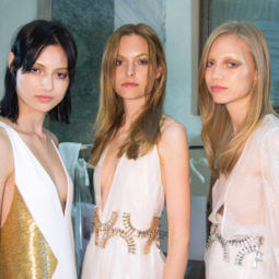 three girls with shiny, healthy straight hair