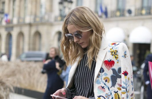 olivia palermo street style shot with light brown hair with blonde highlights